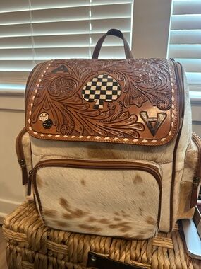 Leather Tooled Haircalf Backpack in Brown